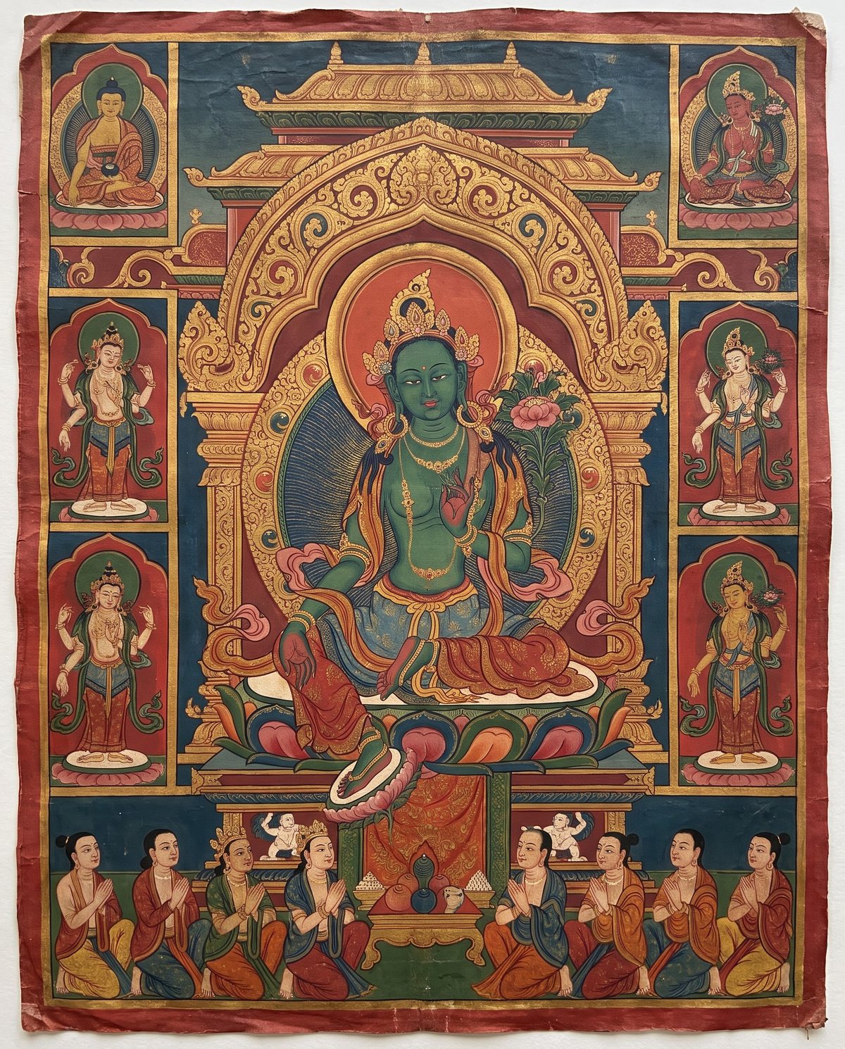 AI design illustration of a Paubha with Green Tara beneath a gilded arch.
